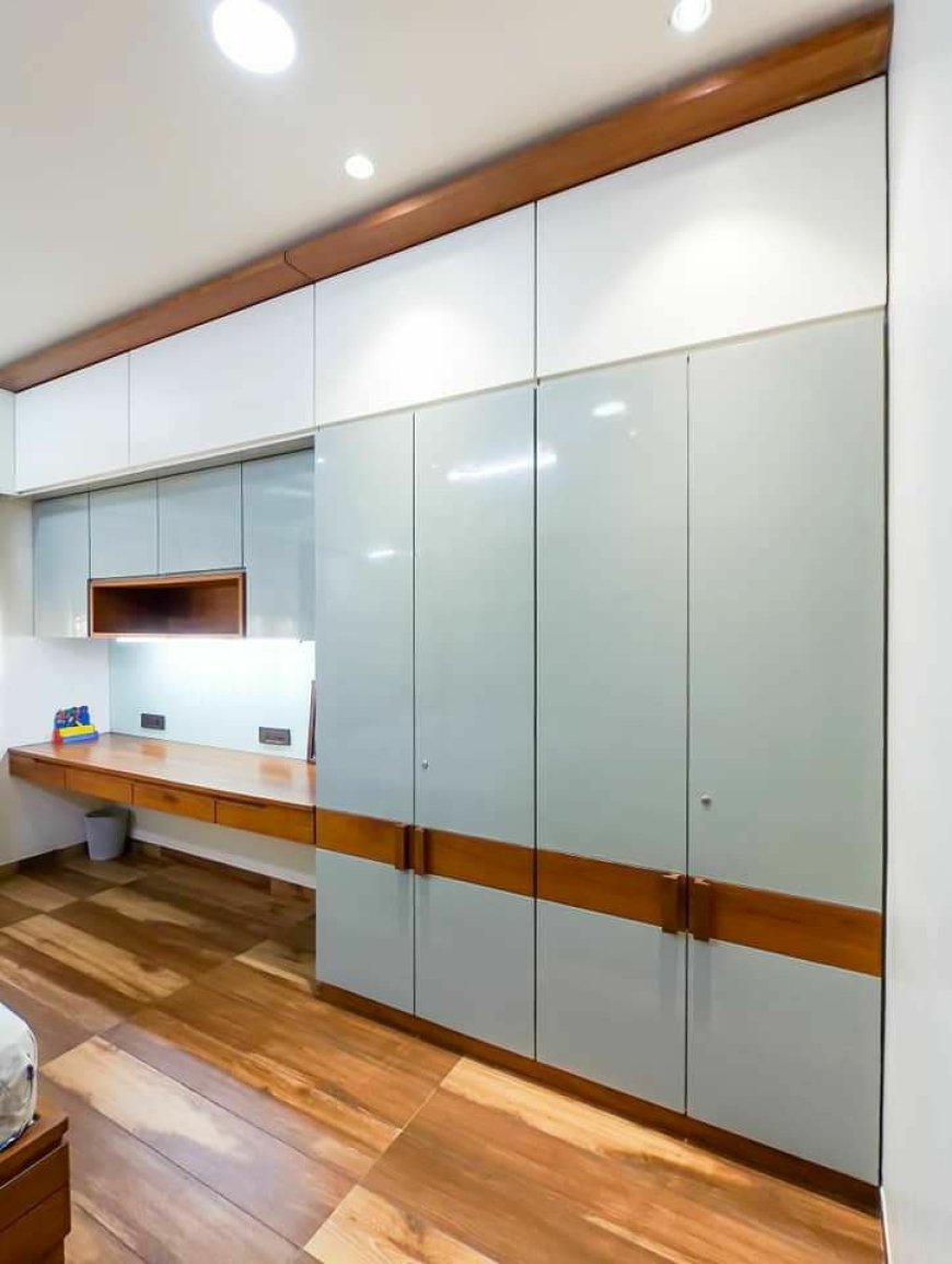 Best Wardrobe Design With Brown & White Finish Laminate