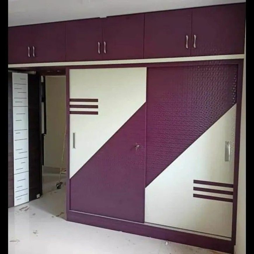 Best Wardrobe Design With White & Violet Laminate