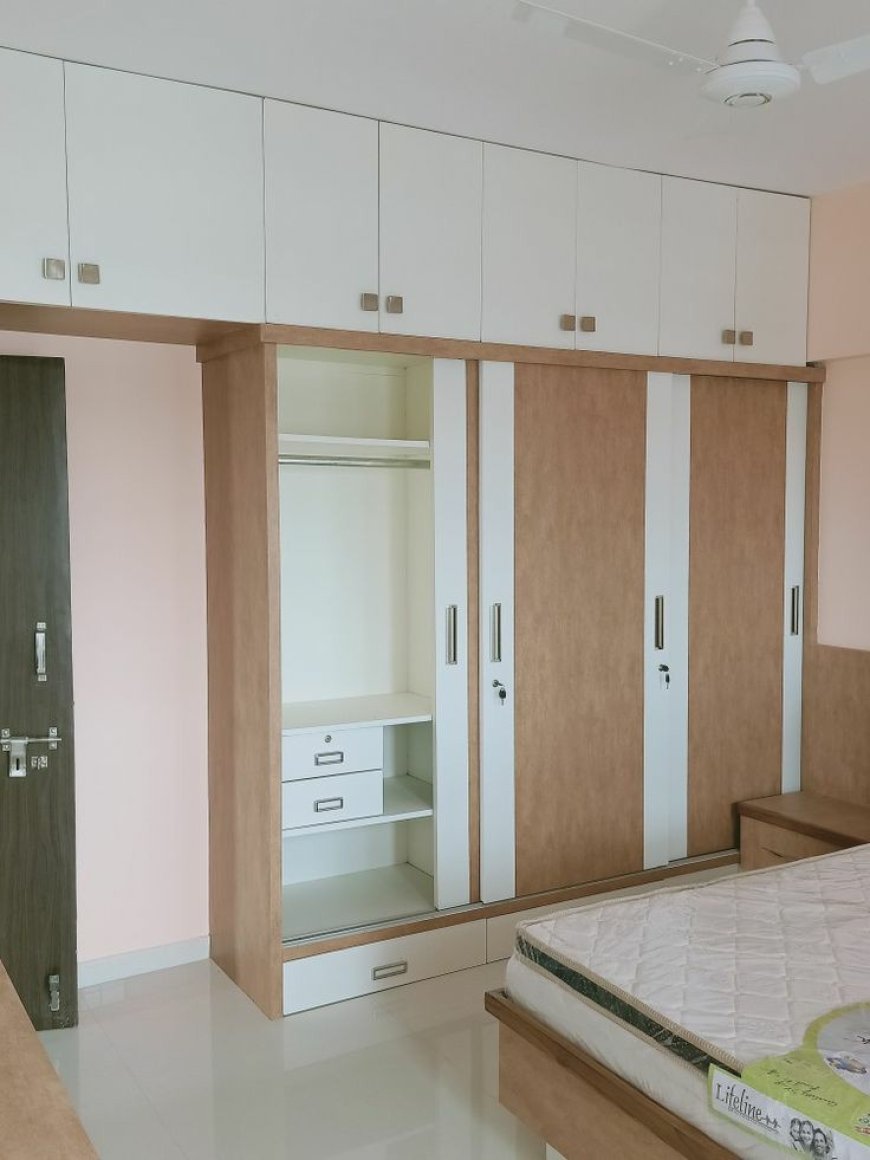 Best Wardrobe Design With White & Wooden Finish Laminate