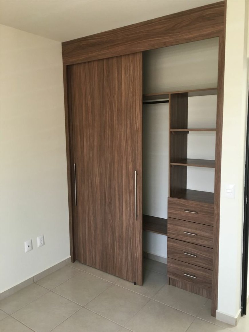 Best Wardrobe Design With Brown Wooden Finish Laminate