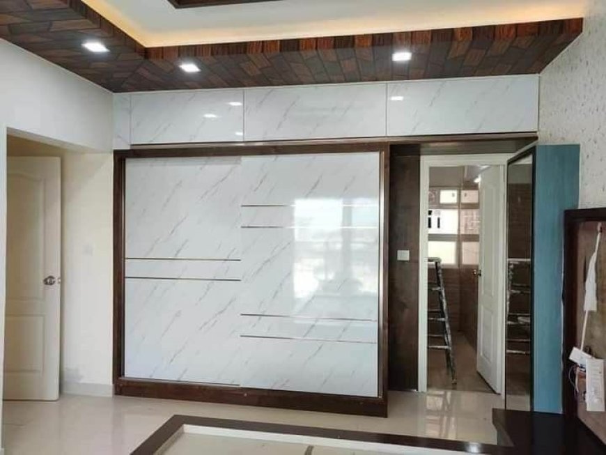 Best Wardrobe Design With Brown & White Glass Finish