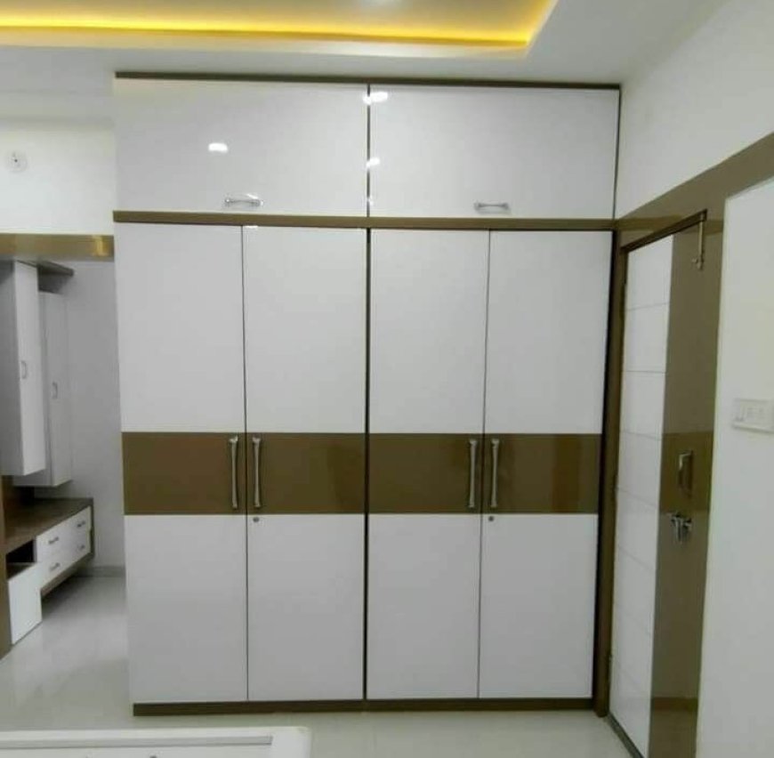 Best Wardrobe Design With White & Brown Mud Color Laminate