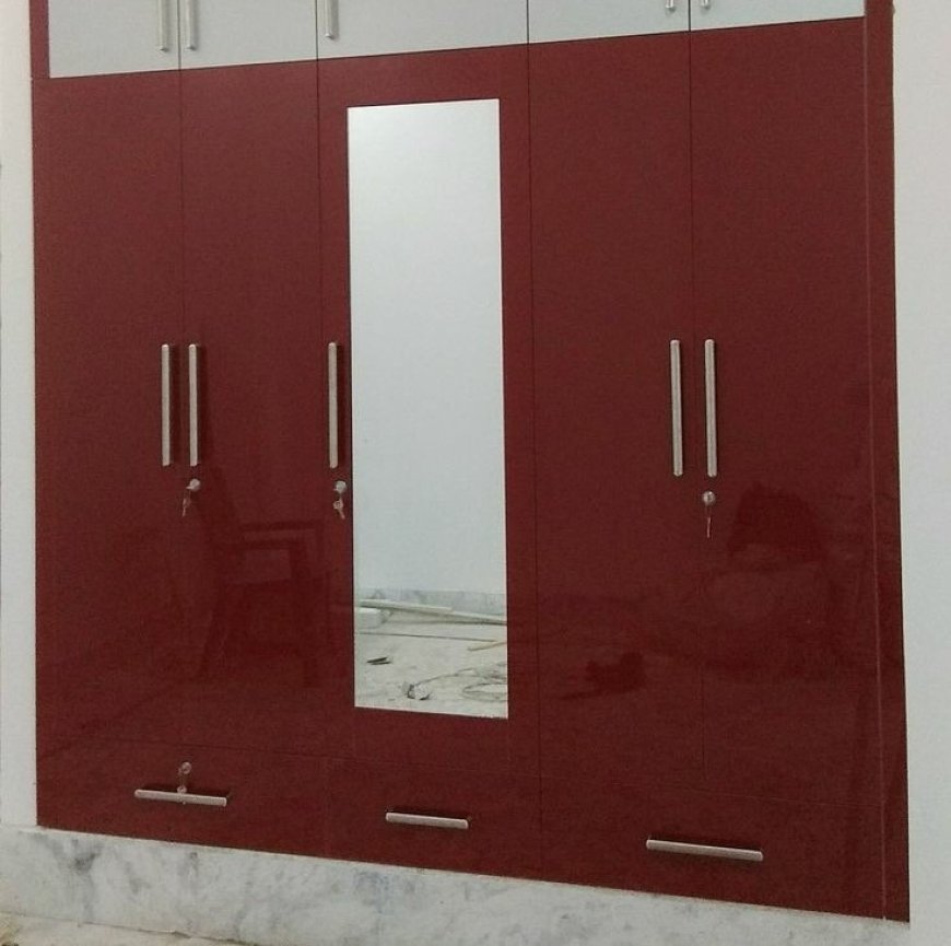 Best Wardrobe Design With Maroon Color Laminate